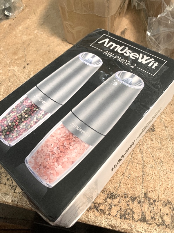 Photo 1 of AmuseWit Gravity Electric Salt and Pepper Grinder Set [White Light] - Battery Operated Automatic Pepper and Salt Mills,Adjustable Coarseness,One-Handed Operation,Stainless Steel