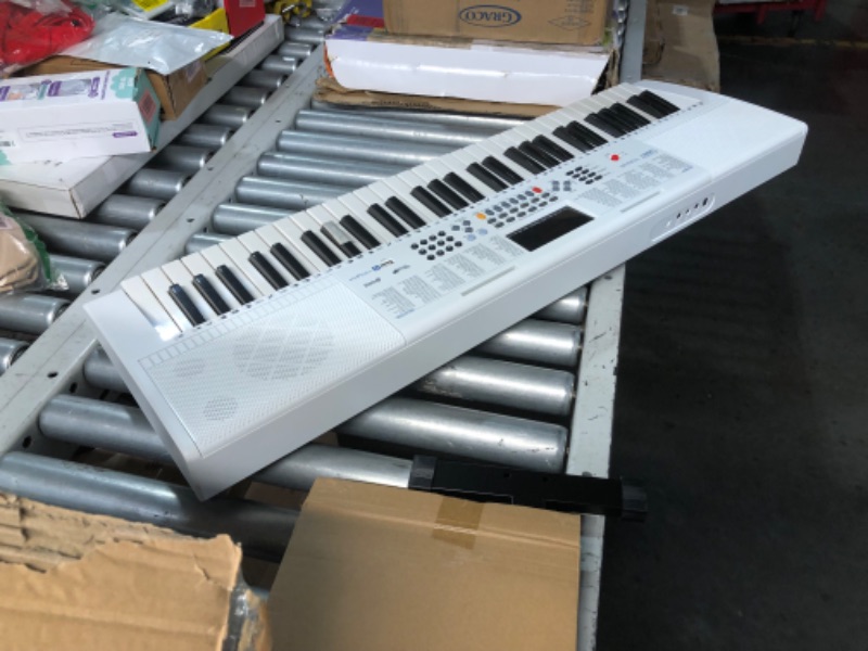 Photo 1 of ***SEE NOTES*** 
Vangoa Piano Keyboard for Beginners, VGK6101 61 Key Learning Keyboard Piano w/Lighted Keys, Electric Piano Keyboard with 600 Voices & 50 Demos, Stand/Microphone, USB, Record, Split for Students