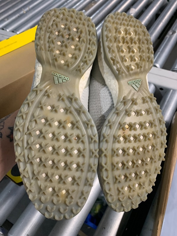 Photo 1 of ***(HEAVILY USED/ MINOR DAMAGE)***adidas Women's FORGEFIBER BOA Golf Shoe, Grey Two/FTWR White/Silver Metallic, 7.5 M US