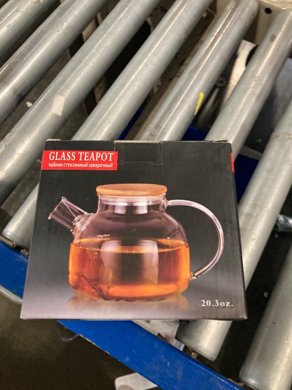 Photo 1 of CnGlass Glass Teapot Stovetop Safe,20.3 oz Clear Tea pot with Removable Filter Spout,Loose Leaf and Blooming Tea Maker