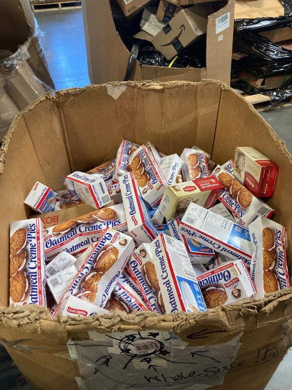 Photo 1 of **EXPIRED**
BUNDEL OF EXPIRED SNACKS. OATMEAL PIE/COOKIES, PEANUTS, CHIPS, RICE, OATMEAL, CHEWY BARS, POPTARTS 