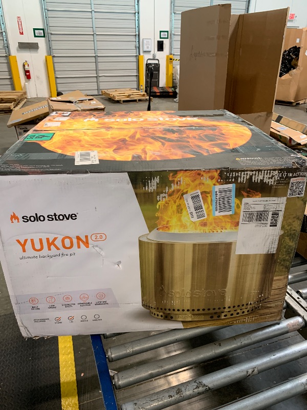Photo 1 of Solo Stove Yukon Essential Bundle | Portable Smokeless Fire Pit Stainless Steel for Wood Burning, Incl. Yukon Fire Pit, Lid and Stand, Diameter: 27in, Height: 19.8in, Weight: 40.35lbs