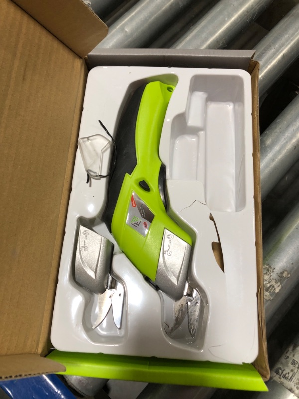 Photo 1 of Loboo Idea Power Electric Fabric Scissors Box Cutter For Crafts, Sewing, Cardboard,Cordless Electric Scissors Fabric Cutter with 2 Cutting Blades, Zip Snip Electric Scissors For Cutting Fabric Cloth.