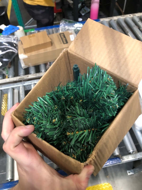Photo 1 of Artificial Christmas Tree 4FT Premium Spruce Tree with Sturdy Metal Stand for Holiday Indoor Xmas Party Decorations