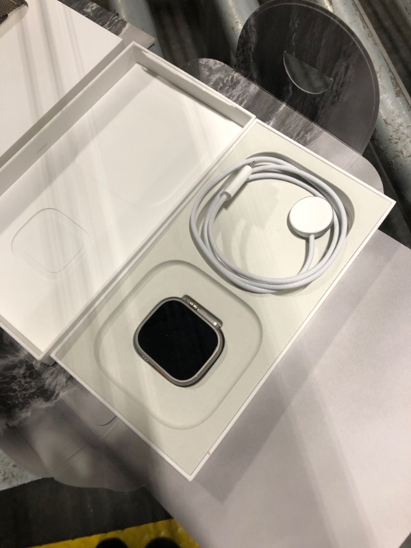 Photo 1 of **LOCKED** Apple Watch Ultra 2 [GPS + Cellular 49mm] Smartwatch, Sport Watch with Natural Titanium Case with Natural Titanium Milanese Loop - Small. Fitness Tracker, Precision GPS, Action Button, Carbon Neutral