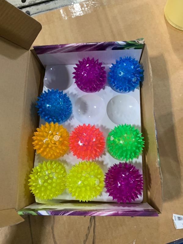 Photo 1 of 12 Pieces Light Up Bouncy Ball for Kids, 2.55" Spiky Sensory Balls for Stress Relief, LED Flashing Balls for Party Favors Student Gifts School Rewards