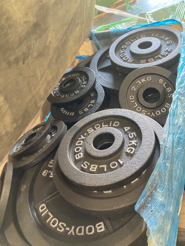 Photo 1 of **MAY BE INCOMPLETE**Body-Solid (OSB355) Cast Iron Olympic Weight Plate Set, Free Weights Dumbbell Plates with 2 Inch Standard Hole for All Olympic Barbell Types, 355 lb Total Weight Sets, Black