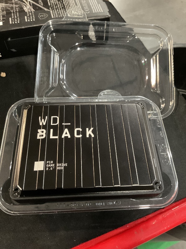 Photo 1 of *Cord not included*NON-FUNCTIONAL, PARTS ONLY***
 WD_BLACK 4TB P10 Game Drive, Portable External Hard Drive, Works with Playstation, Xbox, & PC - WDBA3A0040BBK-WESN