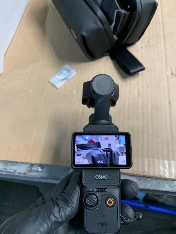 Photo 1 of DJI Osmo Pocket 3 Creator Combo, Vlogging Camera with 1'' CMOS, 4K/120fps Video, 3-Axis Stabilization, Face/Object Tracking, Fast Focusing, Mic Included for Clear Sound, Digital Camera for Photography