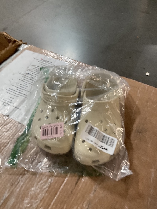 Photo 1 of ***(HEAVILY USED/ MINOR DAMAGE)***
Crocs Kids' Classic Clog | Girls and Boy Shoes, Bone, SIZE 6 US Unisex Big