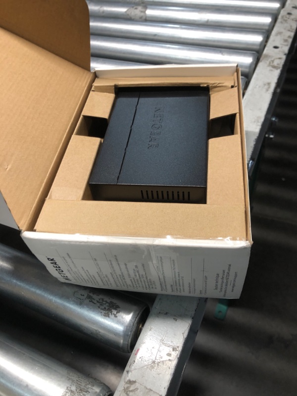 Photo 1 of NETGEAR 5-Port PoE Gigabit Ethernet Unmanaged Essentials Switch (GS305P) - with 4 x PoE+ @ 63W, Desktop or Wall Mount