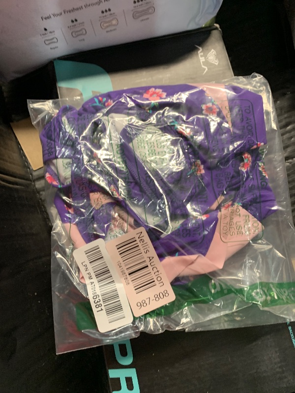 Photo 1 of (used) Kanu Surf Girls' Morgan Floral Ruffle 1-Shoulder 1-Piece Swimsuit, Purple, 8
