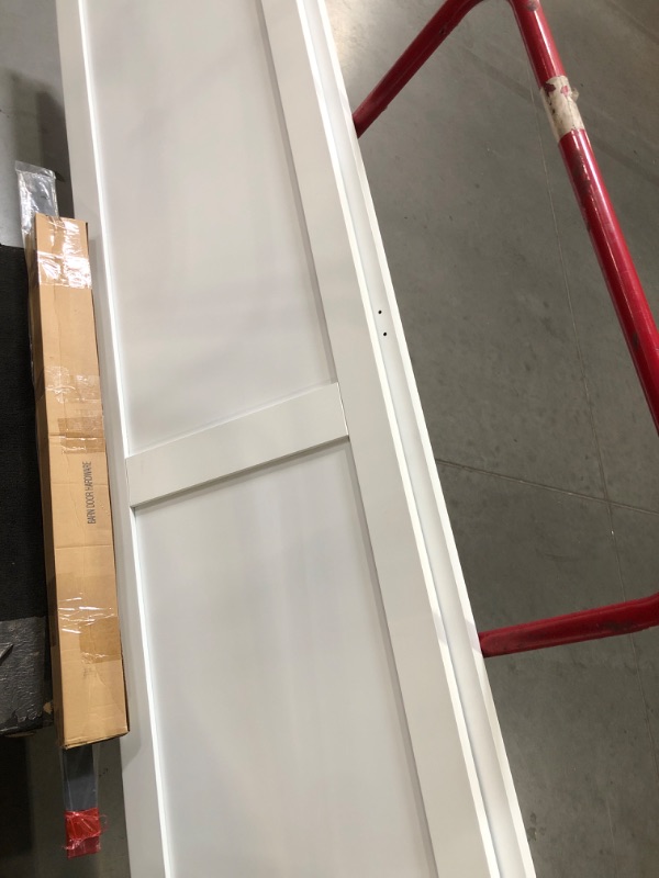 Photo 1 of *HEAVY PICKUP*  Pre-Assembled Solid Core Panels Bifold Barn Door 40" (20" x 2) x 84" and 44" Track Kit Included, Paintable White Primed Finished Bi Fold Barn Door for Interior, H-Shape Bifold Sliding Barn Door