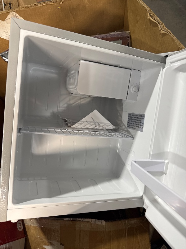 Photo 1 of (PARTS) (WONT COOL) (DAMAGED) Frigidaire EFR176 Retro Compact Fridge with Chiller Mini Refrigerator with Built-in Bottle Opener for Office, Bedroom, Dorm Room or Cabin, 1.6 cu ft 16" D x 18" W x 18.5" H, Moonlight