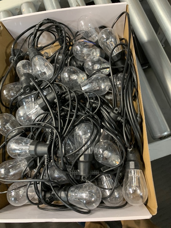 Photo 1 of ***(HEAVILY USED/ PARTS ONLY)***Outdoor String Lights 100FT, Outdoor Lights for Patio with 40 Dimmable RGBW LED Bulbs, IP66 Waterproof Shatterproof, with APP Control & Remote, 24V Adapter Color Change,for Backyard Decor