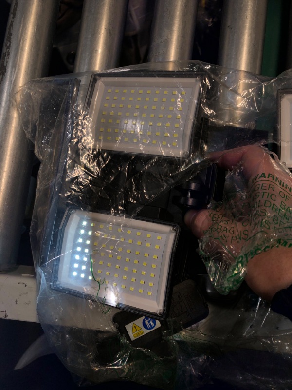 Photo 1 of (POWER TESTED) (BAGGED) YOYONACY Solar Lights Outdoor, 2500 Lumen 3 Heads Solar Motion Sensor Lights, Waterproof Solar Powered Security Flood Lamp,Super Bright Illumination Large Area