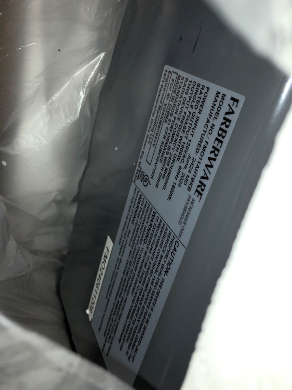 Photo 1 of (for parts/ broken) Farberware FMO11AHTBKBD1 Countertop 1000 Watts Microwave Oven with LED Lighting and Child Lock-Perfect for Apartments and Dorms-Easy Clean, 1.1 Cu. Ft, Stainless Steel