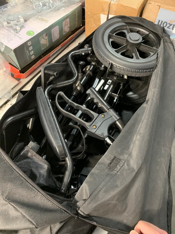 Photo 1 of (PARTS) (NOT A COMPLETE SET) (SEAT DAMAGED) Medwarm Ultralight Transport Wheelchair for Adults & Kids, Weights only 22lbs, Folding Travel Wheelchair with Handbrakes, Detachable Footrests, Swing Away Armrests and 12" Rear Wheels, Black