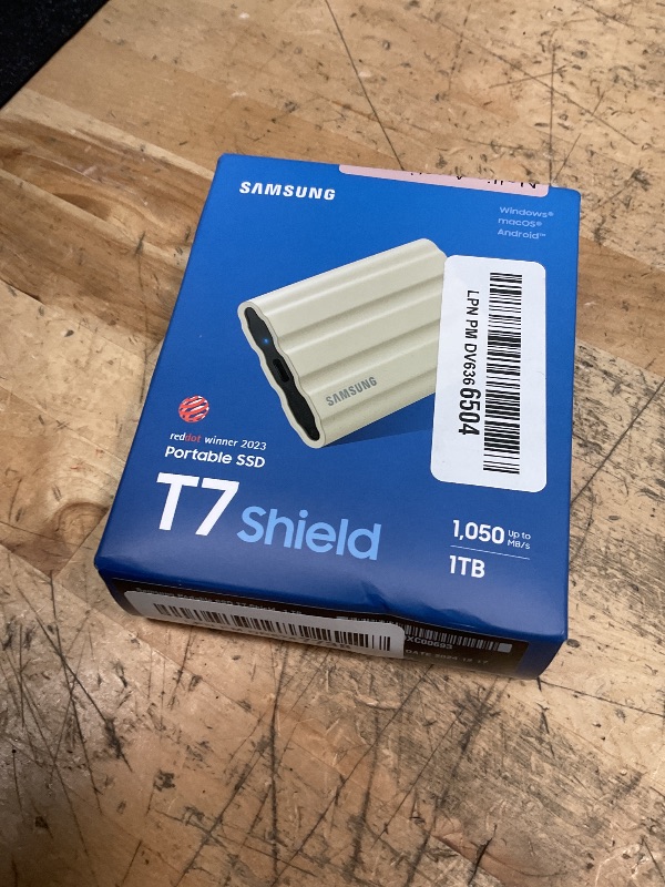 Photo 1 of SAMSUNG T7 Shield Portable External Solid State Drive USB 3.2 1TB, IP65 Water Resistant, Compatible with PC/Mac/Android/Gaming Consoles (MUPE1T0K/AM), Beige