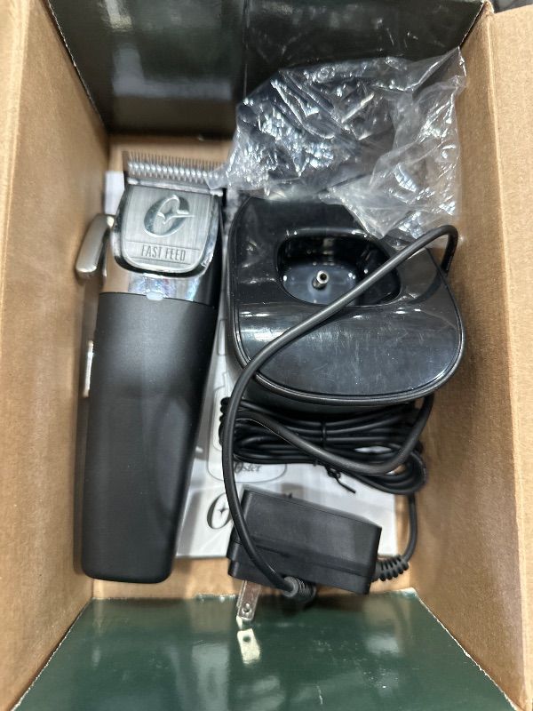 Photo 1 of (used) Oster Professional Fast Feed Cordless Clipper Black, Clippers Ideal for Cutting and Fading All Hair Types, Including Thick, Thin, Tangled, Wet, or Dry