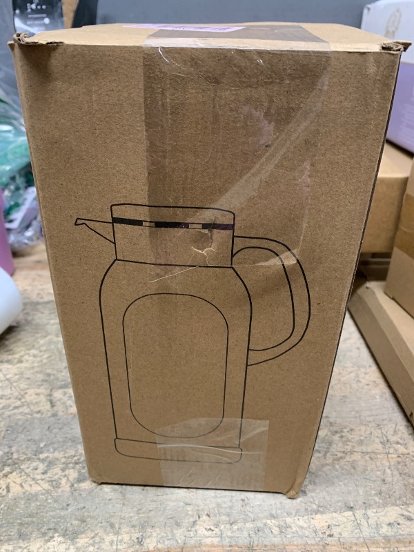 Photo 1 of Delove 68 oz/2 Liter Glass Pitcher with Shatterproof Shell - Heat Resistant Glass Liner - Stainless Steel Lid - Carafe & Jug for Iced Tea,Hot/Cold Water,Homemade Juice Beverages (Pink)