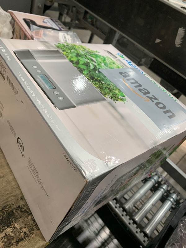 Photo 1 of AeroGarden Harvest Elite Indoor Garden Hydroponic System with LED Grow Light and Seed Kit, Holds up to 6 Pods, Stainless Steel
