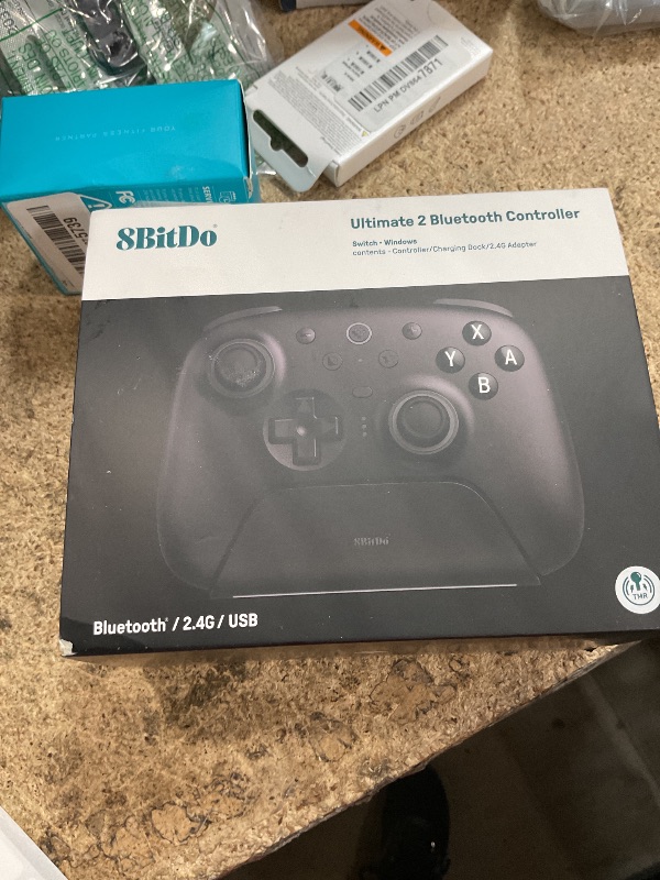 Photo 1 of 8BitDo Ultimate 2 Bluetooth Controller with TMR Joysticks for Switch, Windows PC, Gaming Controller with Switchable Hall Effect/Tactile Triggers, RGB Fire Ring, Charging Dock,Vibration and Motion control (Black, Ultimate 2 Bluetooth)