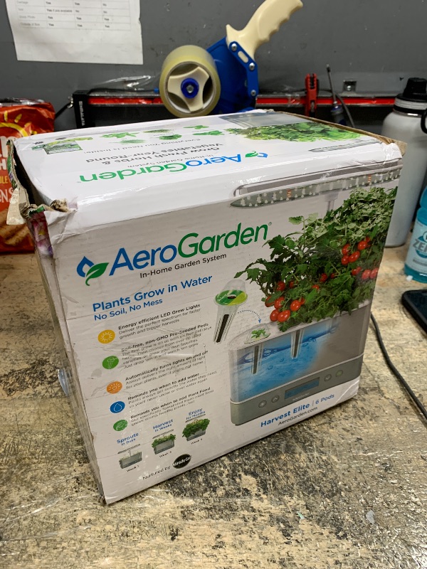 Photo 1 of AeroGarden Harvest Elite Indoor Garden Hydroponic System with LED Grow Light and Seed Kit, Holds up to 6 Pods, Stainless Steel