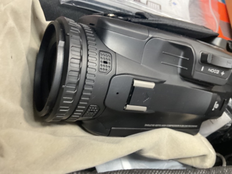 Photo 1 of Minolta 64MP Autofocus Video Camera with Microphone & Video Light, 4" Touchscreen, 4K Ultra HD Video, 18x Digital Zoom, WiFi, Stabilizer, 32GB Card, 3100mAh Battery, Carrying Bag (Black)