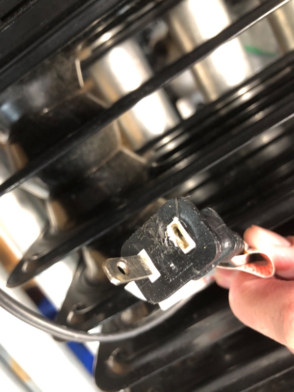Photo 1 of ***DAMAGED - PRONG ON PLUG BROKEN - SEE PICTURES***
Amazon Basics Oil Heater, Radiator Heater for Indoor Use, With Over-Heat Protection, 7 Oil-Filled Steel Fins, 3 Heat Settings, ETL-certified Safety, 1500W, Black, 11"D x 14.8"W x 25.2"H