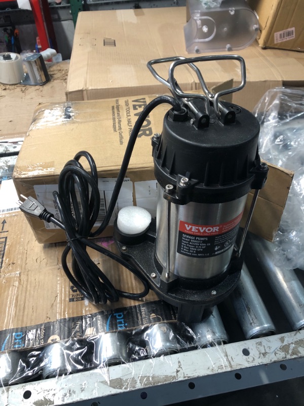 Photo 1 of (SIGN OF USE) (POWER TESTED) (USED/FAIR) VEVOR Submersible Sump Pump, 0.75HP 5000GPH, 28 FT Lift Cast Iron Sewage Water Pump with 10 ft Power Cord and Automatic Float Switch, Stainless Steel for Clean Flooded Basement Yard Farm Sewer
