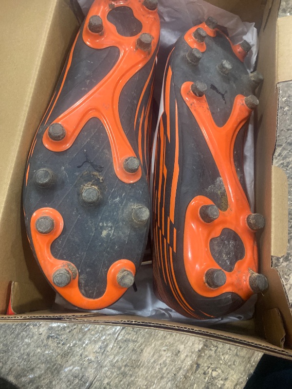 Photo 1 of (MINOR USAGE) PUMA Men's RAPIDO III FIRM GROUND/ARTIFICIAL GROUND Soccer Cleat, Puma Black-Puma White-Dragon Fire, 9.5