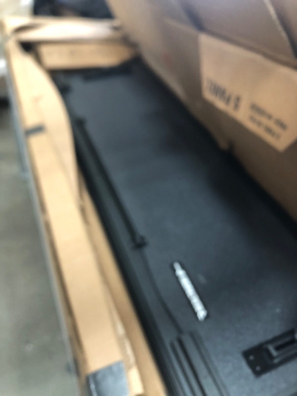 Photo 1 of RealTruck BAK BAKFlip MX4 Hard Folding Truck Bed Tonneau Cover | 448427 | Fits 2016 - 2023 Toyota Tacoma w/ OE track system 6' 2" Bed (73.7")