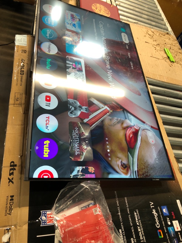 Photo 1 of (DAMAGED TOP RIGHT OF SCREEN) 
TCL 43-Inch Q65 QLED 4K UHD Smart TV with Google TV (43Q651G, 2024 Model) Dolby Vision, Dolby Atmos, HDR Pro+, Game Accelerator Enhanced Gaming, Voice Remote, Works with Alexa, Streaming Television