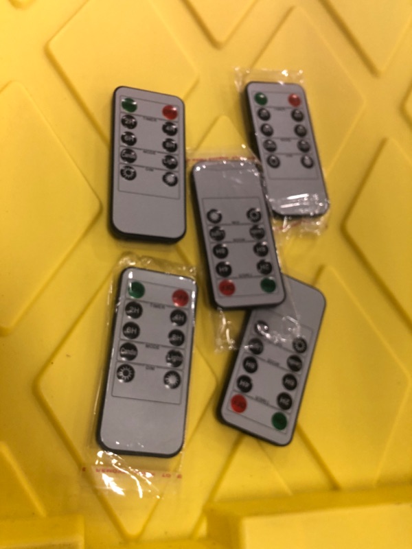 Photo 1 of 5 Pack of Battery-Operated 10-Button Remote Control for Flicker Flame Candle Light Set