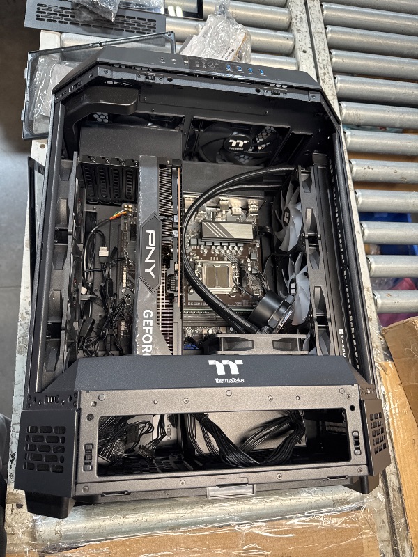 Photo 1 of ***SEE NOTES***
Thermaltake Reactor 9080 Gaming Desktop (AMD Ryzen™ 9 9900X3D, ToughRam 32GB DDR5 6400MT/s RGB Memory, NVIDIA® GeForce RTX™ 5080, 2TB NVMe M.2, WiFi, Windows 11) T6BK-X87B-580-LCS