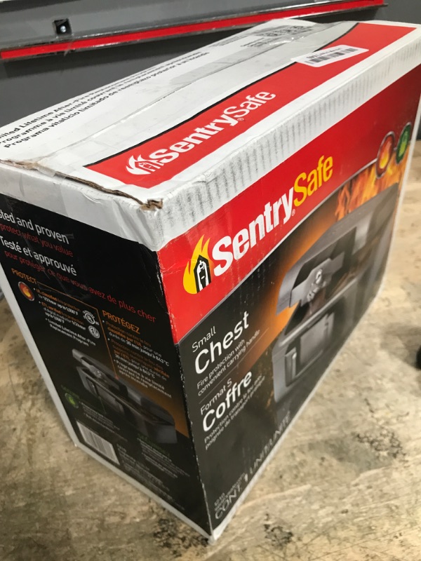 Photo 1 of SentrySafe Fireproof Safe with Key Lock, Chest Lock Box for Home or Travel Secures Money, Documents, 0.18 Cubic Feet, 6.1 x 14.3 x 11.2 Inches, 1210