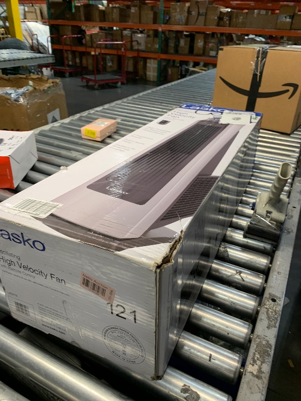 Photo 1 of (Used)(dirty)(see images) Lasko High Velocity Oscillating Tower Fan for Bedroom, Garage, Basement, and Gym with Remote Control, Timer, 3 Powerful Speeds, 35" Silver/Black, U35115