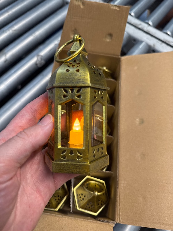 Photo 1 of (missing 1) (POWER TESTED) (GOOD/FAIR) Mini Lantern with Flickering LED Candles Set of 10, Hewory Gold Vintage Decorative Hanging Candle Lanterns for Halloween, Christmas, Wedding Decorations, Party, Table Centerpiece, Battery Included