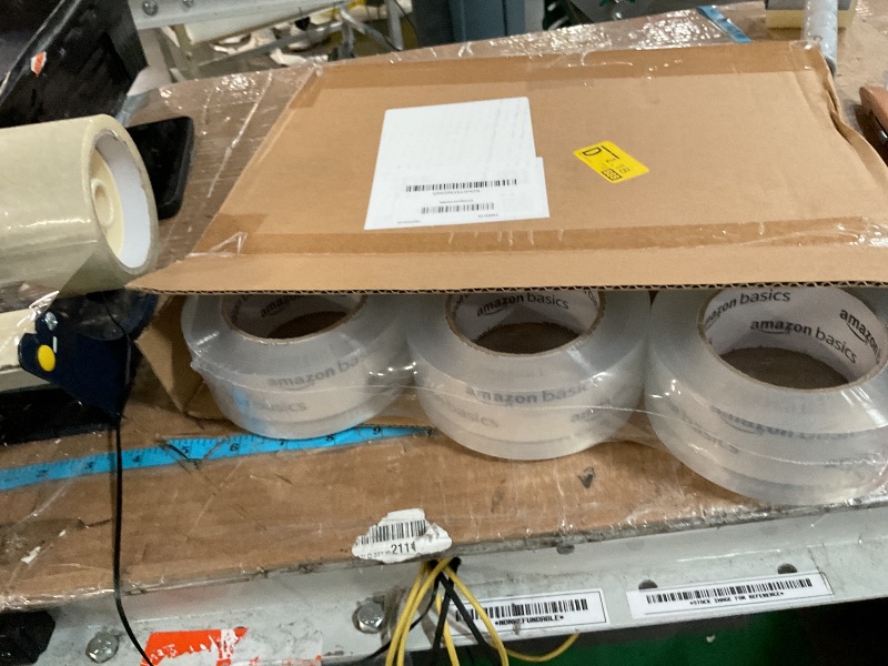 Photo 1 of Amazon Basics Strong Plastic Adhesive Packaging Tape for Shipping, Moving and Storage, Water Base, Crystal Clear, Low Odor, 1.88-Inch x 109 Yards, 6-Pack