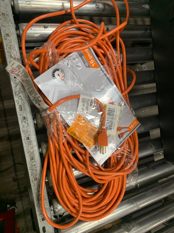 Photo 1 of 100 ft. 16/3 Light Duty Indoor/Outdoor Extension Cord, Orange

