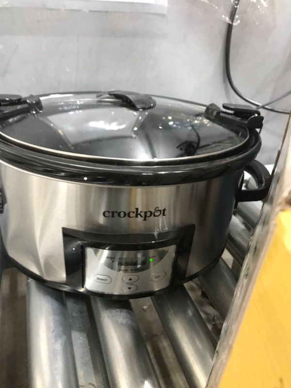 Photo 1 of **************HANDLE ON LID IS BROKEN*************
Crock-Pot 6 Quart Cook & Carry Programmable Slow Cooker with Digital Timer Stainless Steel (CPSCVC60LL-S) pack of 1