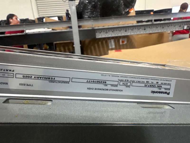 Photo 1 of -POWERS ON**Panasonic - 2.2 Cu. Ft. 1250 Watt SN97JS Microwave with Cyclonic Inverter and Sensor Cooking - Stainless steel