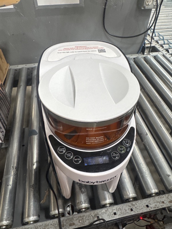Photo 1 of *POWERS ON**Baby Brezza New and Improved Formula Pro Advanced Formula Dispenser Machine - Automatically Mix a Warm Formula Bottle Instantly - Easily Make Bottle with Automatic Powder Blending, White