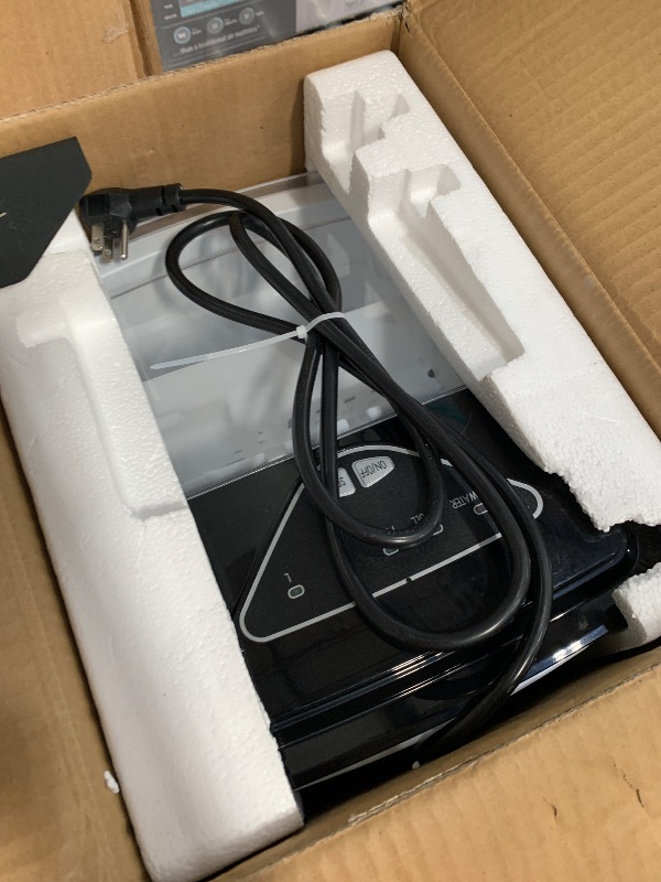 Photo 1 of ** powers on but does not get cold ** Frigidaire EFIC123-SSBLACK Compact Countertop Ice Maker, 26lbs of Ice per Day, Black Stainless