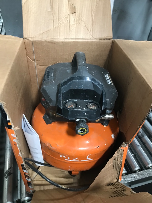 Photo 1 of ***PARTS ONLY***RIDGID 6 Gal. 150 PSI Portable Electric Oil-Free Jobsite Pancake Air Compressor with Dual Pressure Gauges and 2-Quick Couplers 02106416