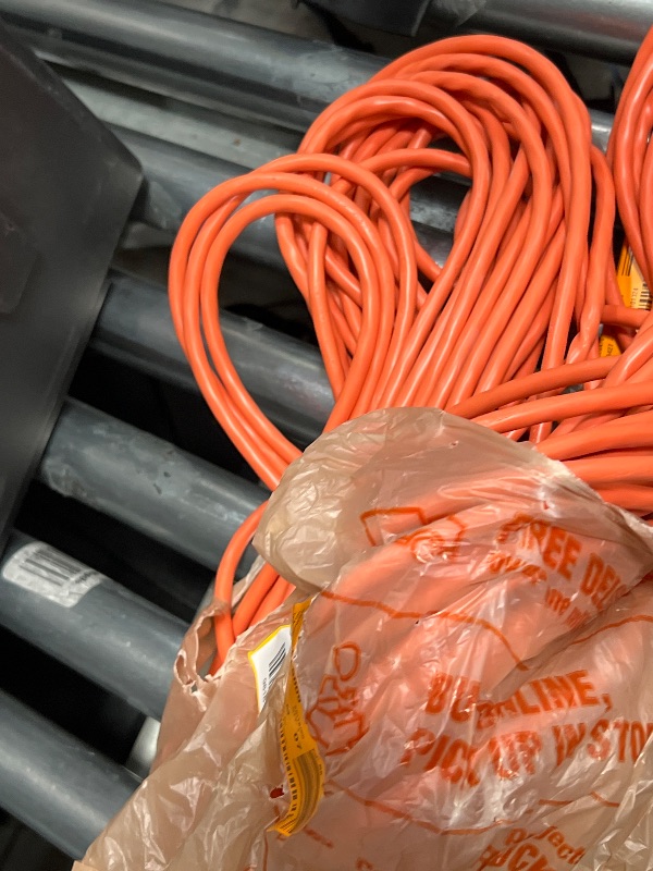 Photo 1 of 100 ft. 16/3 Light Duty Indoor/Outdoor Extension Cord, Orange
