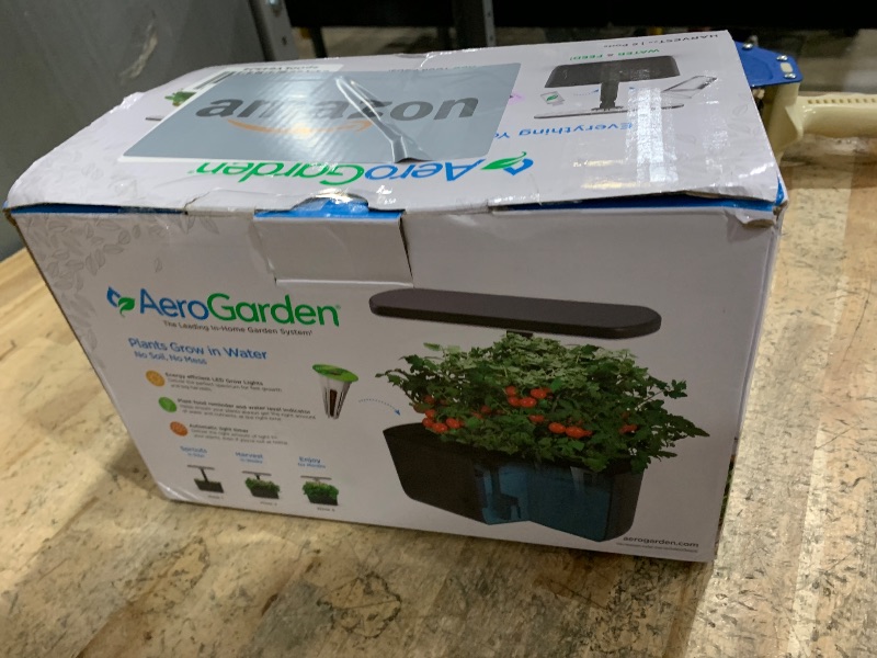 Photo 1 of AeroGarden Harvest 2.0, Indoor Garden Hydroponic System with LED Grow Light, Holds up to 6 AeroGarden Pods, Charcoal