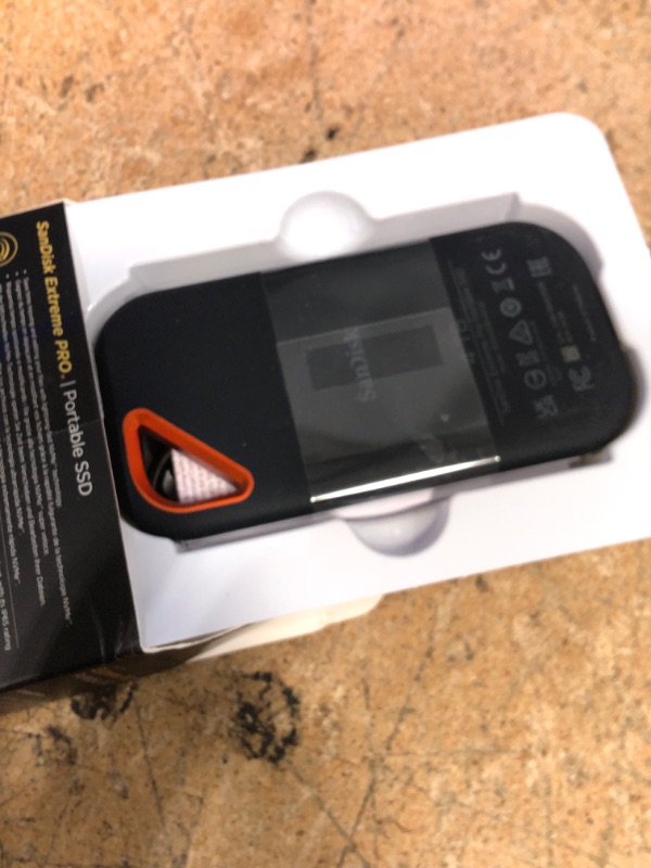 Photo 1 of *FOR PARTS ONLY* SanDisk 1TB Extreme PRO Portable SSD - Up to 2000MB/s - USB-C, USB 3.2 Gen 2x2, IP65 Water and Dust Resistance, Updated Firmware - External Solid State Drive - SDSSDE81-4T00-G25