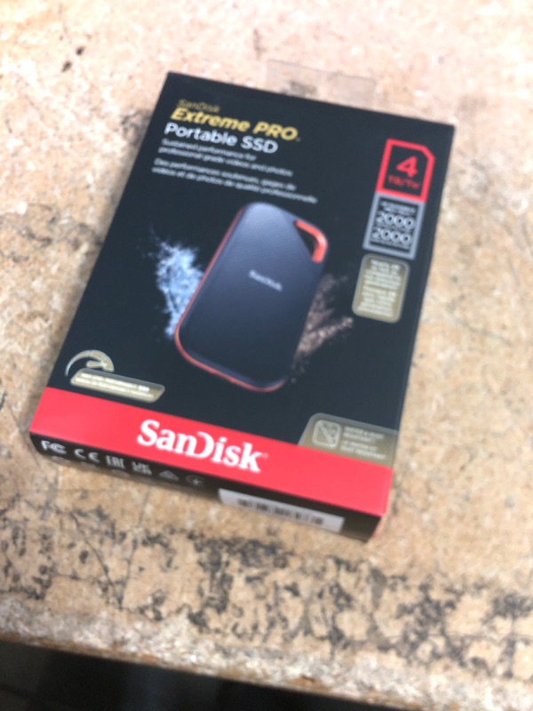 Photo 1 of *FOR PARTS ONLY* SanDisk 1TB Extreme PRO Portable SSD - Up to 2000MB/s - USB-C, USB 3.2 Gen 2x2, IP65 Water and Dust Resistance, Updated Firmware - External Solid State Drive - SDSSDE81-4T00-G25